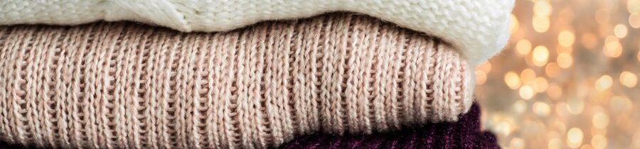 warm-sweaters-pile-knitted-clothes-sweaters-knitwear-autumn-winter-concept_176445-1793